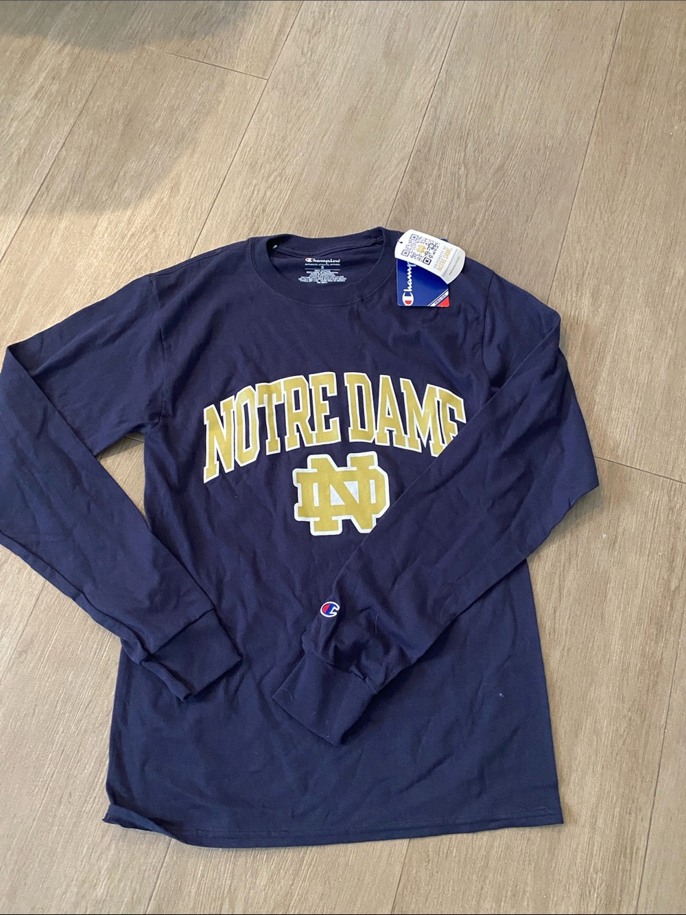 NWT.   Champion Navy Notre Dame Arch Long Sleeve Tee with Gold Logo